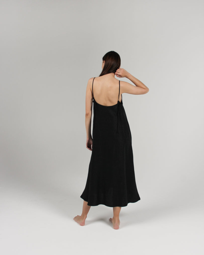 The Cala Slip Dress in Jet Black